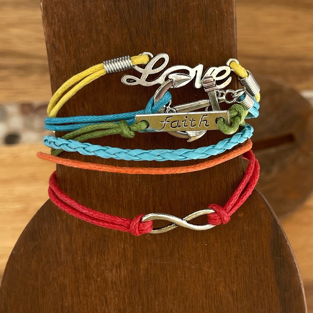 Multi color Braided leather multi strand love themed bracelet